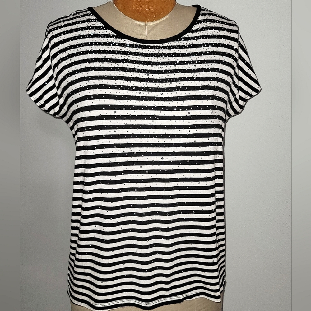 Design History Black and White stripe with silver sparkles on the front.  Sz M